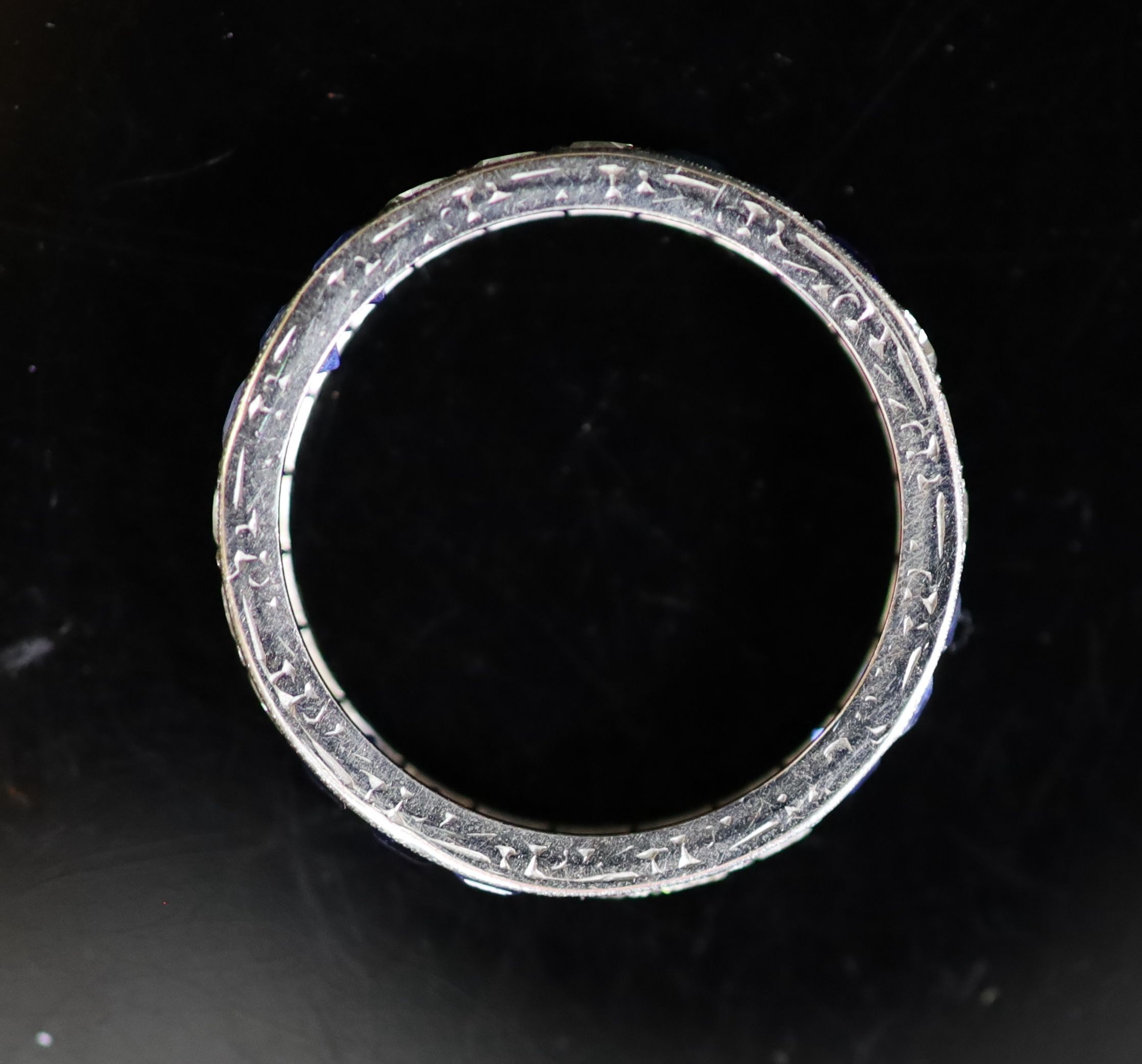 A platinum, sapphire and diamond set full eternity ring